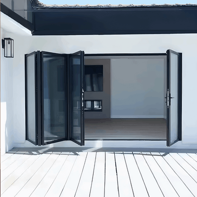 15 foot wide bi-fold panoramic folding glass doors opening to a modern interior space with sleek design.