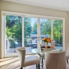 12 Foot Wide Aluminum Bi-Parting 4-Panel Thermal Patio Door - (Multiple Heights) with scenic view from inside a modern home.