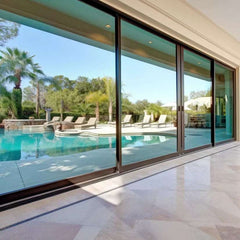 26 Foot Wide Aluminum Sliding 4-Panel Panoramic Patio Door Thermal (Multiple Heights) with pool view.