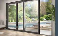 8 Foot Wide Sliding 2-Panel Panoramic Door (Multiple Heights) opening to a poolside view.
