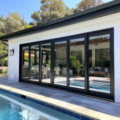 8-foot wide bi-fold panoramic glass door with black frames, modern exterior design, enhancing indoor-outdoor living.