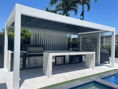 Commercial Pergolas – Modern outdoor kitchen design with a sleek aluminum pergola.