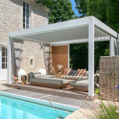 Stylish commercial pergolas featuring Apex Smart Pergola beside a pool with modern outdoor furniture.